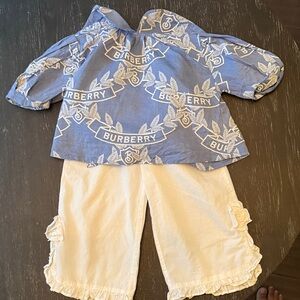 Burberry Blue Patterned Top with White Pants